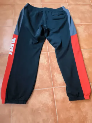 Pantalón chándal Nike negro y rojo