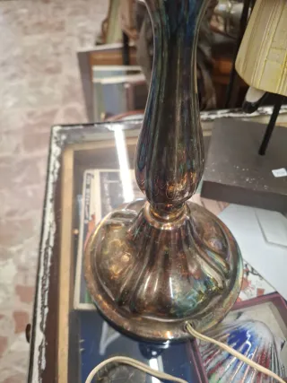 Lámparas de alpaca doradas y plateadas