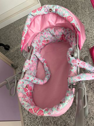 Carrito y trona de juguete rosa