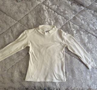 Maglia dolcevita manica lunga neutra   8/9 anni