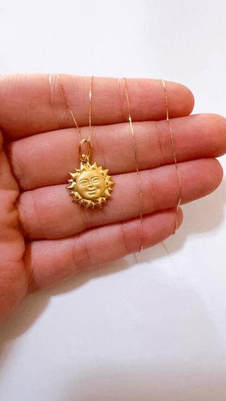 Collana con pendente sole in oro giallo 18kt 750