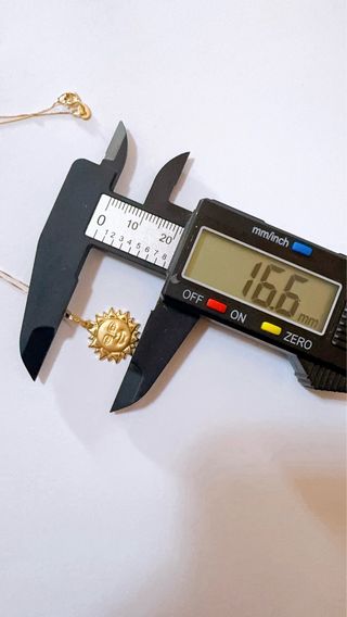 Collana con pendente sole in oro giallo 18kt 750