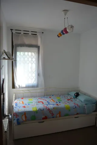 Cama nido metálica.