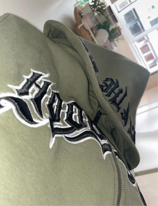 Sudadera con capucha y cremallera verde