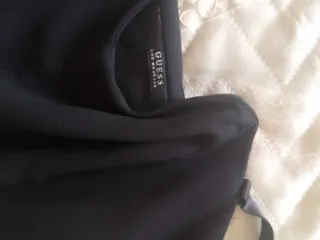 Top con stecche al seno e volant