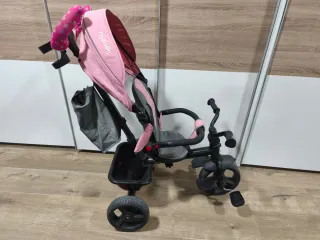 Triciclo infantil rosa y gris