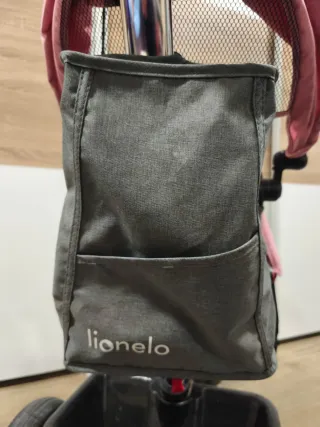 Triciclo infantil rosa y gris