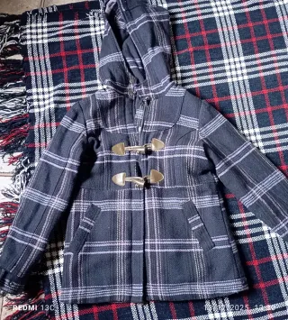 Trenca de niña a cuadros