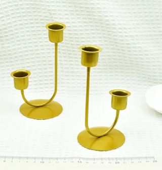 Candelabri dorati in metallo