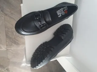 Zapatos planos negros cómodos