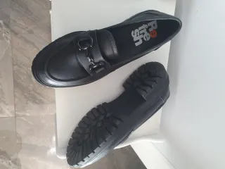 Zapatos planos negros cómodos