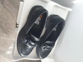 Zapatos planos negros cómodos