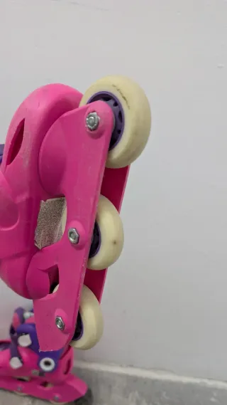 Patines rosas y morados niña + casco