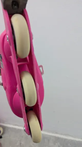 Patines rosas y morados niña + casco