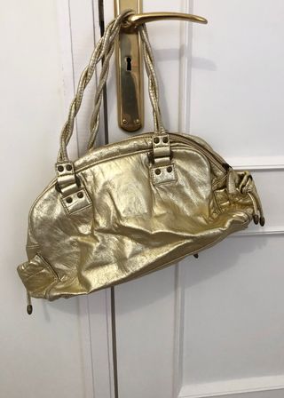 Bolso dorado de Zara