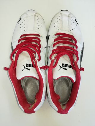 Zapatillas Puma blancas y rojas en buen estado