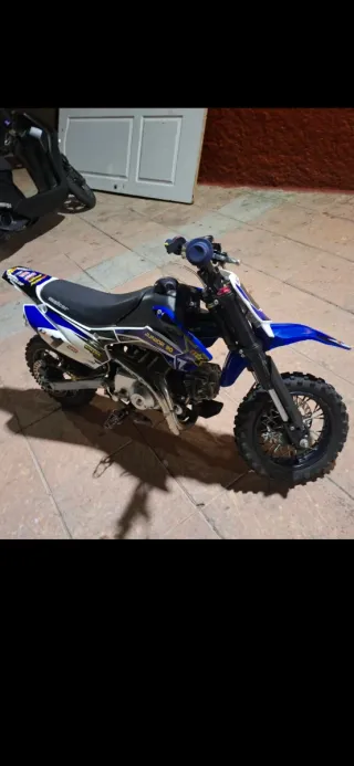 Moto Cross 90cc Azul estado como nueva