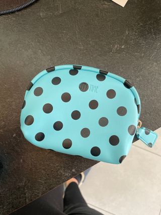 Pochette con pois blu e zip