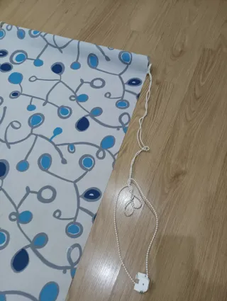 Estor enrollable con diseño de círculos