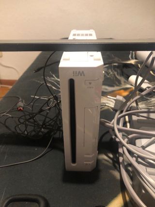 Nintendo Wii con 2 controles y juegos