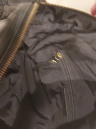 Bolso de piel de cordero nuevo