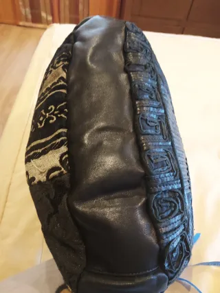 Bolso de piel de cordero nuevo