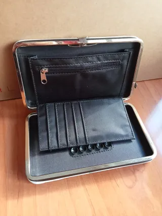 Cartera de mano con frase