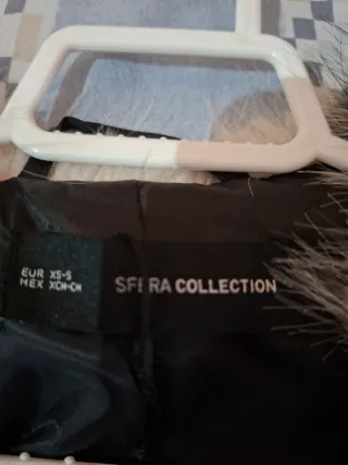 Abrigo peludo estampado cebra talla L