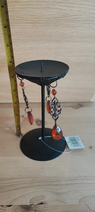 Portacandele in metallo con decorazioni