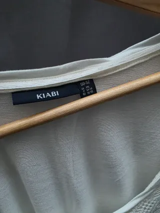 Blusa blanca con encaje y doble forro talla 50-52