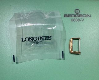 Hebilla Longines dorada