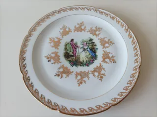 Sei piatti piani in porcellana