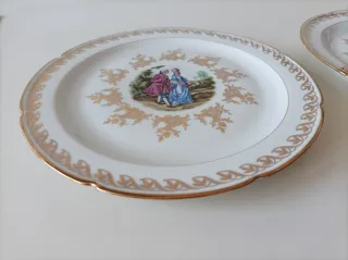 Sei piatti piani in porcellana