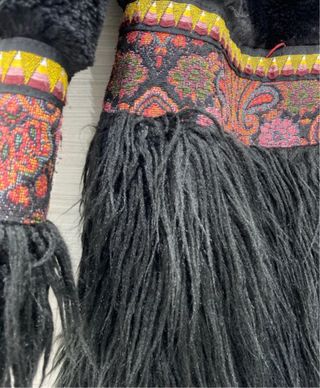 Cappottino pelliccia sintetica nero con frange