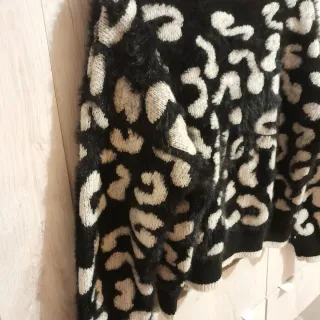 Maglione nero e bianco