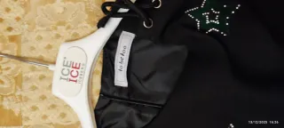 Abito nero bambina/ragazza con decorazioni stelle