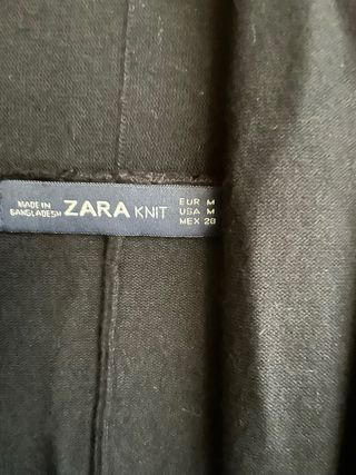 Chaqueta Zara punto cremallera oversize.