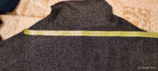 Abito dolcevita nero e oro scintillanti