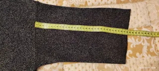 Abito dolcevita nero e oro scintillanti