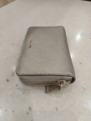Cartera Parfois dorada pequeña
