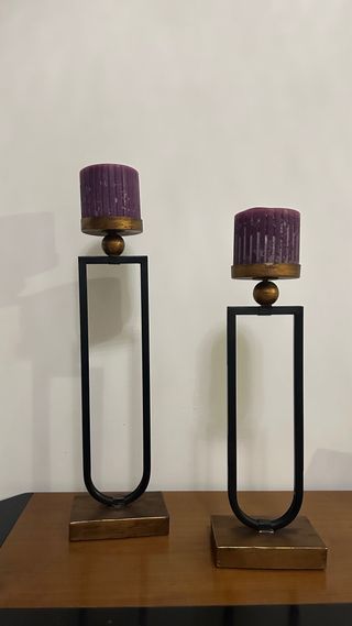 Candelabri neri e dorati