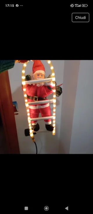 Babbo Natale con scala luminosa