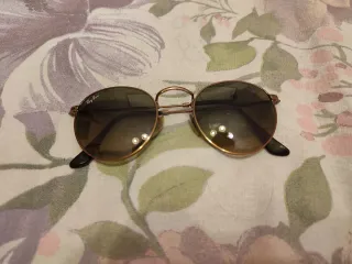 Gafas de sol Ray-Ban redondas doradas