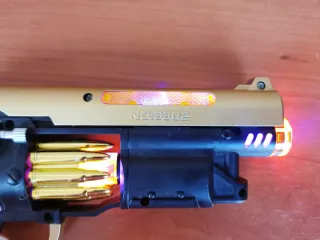 Pistola de Juguete Dorada con Tambor