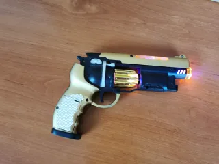 Pistola de Juguete Dorada con Tambor