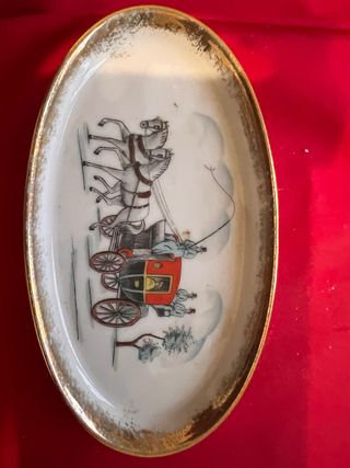 Piattino vintage con carrozza e cavalli