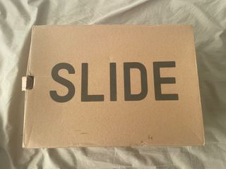 Ciabatte Adidas Yeezy grigie