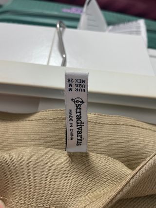 Pantalones acampanados Beige