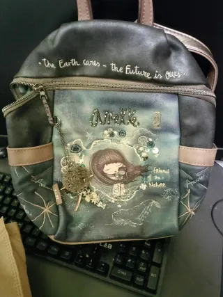 Mochila Anekke beige y gris