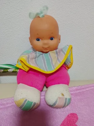 Peluche bebé sonriente